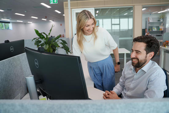 people working on a computer